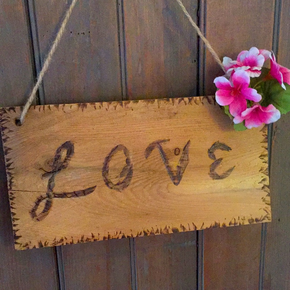 Hand burned sign